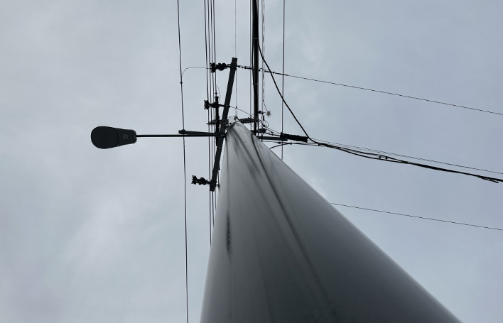 Looking up at a Trident utility pole