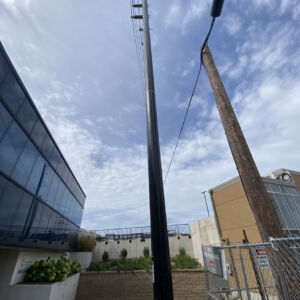 Trident single-layer composite pole in limited access small city area