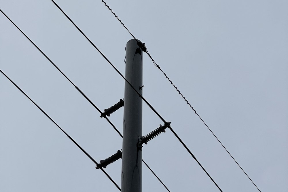 single layer composite pole on cloudy day