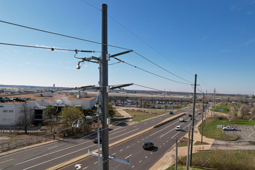 Trident composite multi-layer pole next to road